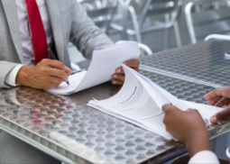 Free-Photo-Free-photo-business-partners-checking-and-signing-document